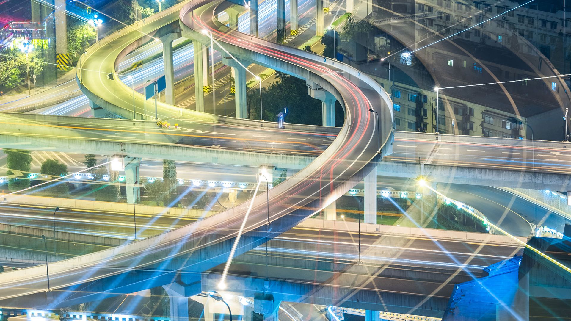 Connected Highway illuminated with lights at night.